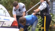 Bearded man handcuffed by policewoman - Videoclip.bg