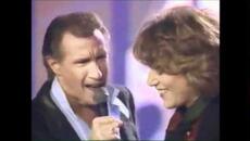 Bill Medley and Jennifer Warnes.  The Time Of My Life - Videoclip.bg
