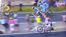 Момче кара на една гума паралелно със състезателите на Tour de France 2014 - Videoclip.bg