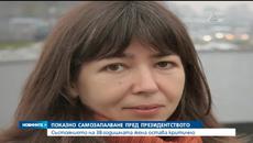 Палят свещ за самозапалилата се жена пред парламента - Videoclip.bg